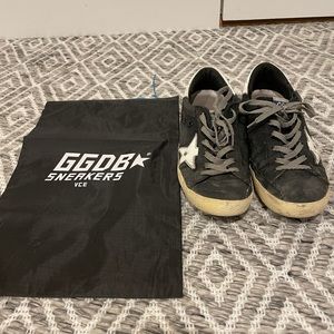 Low top black superstar golden goose